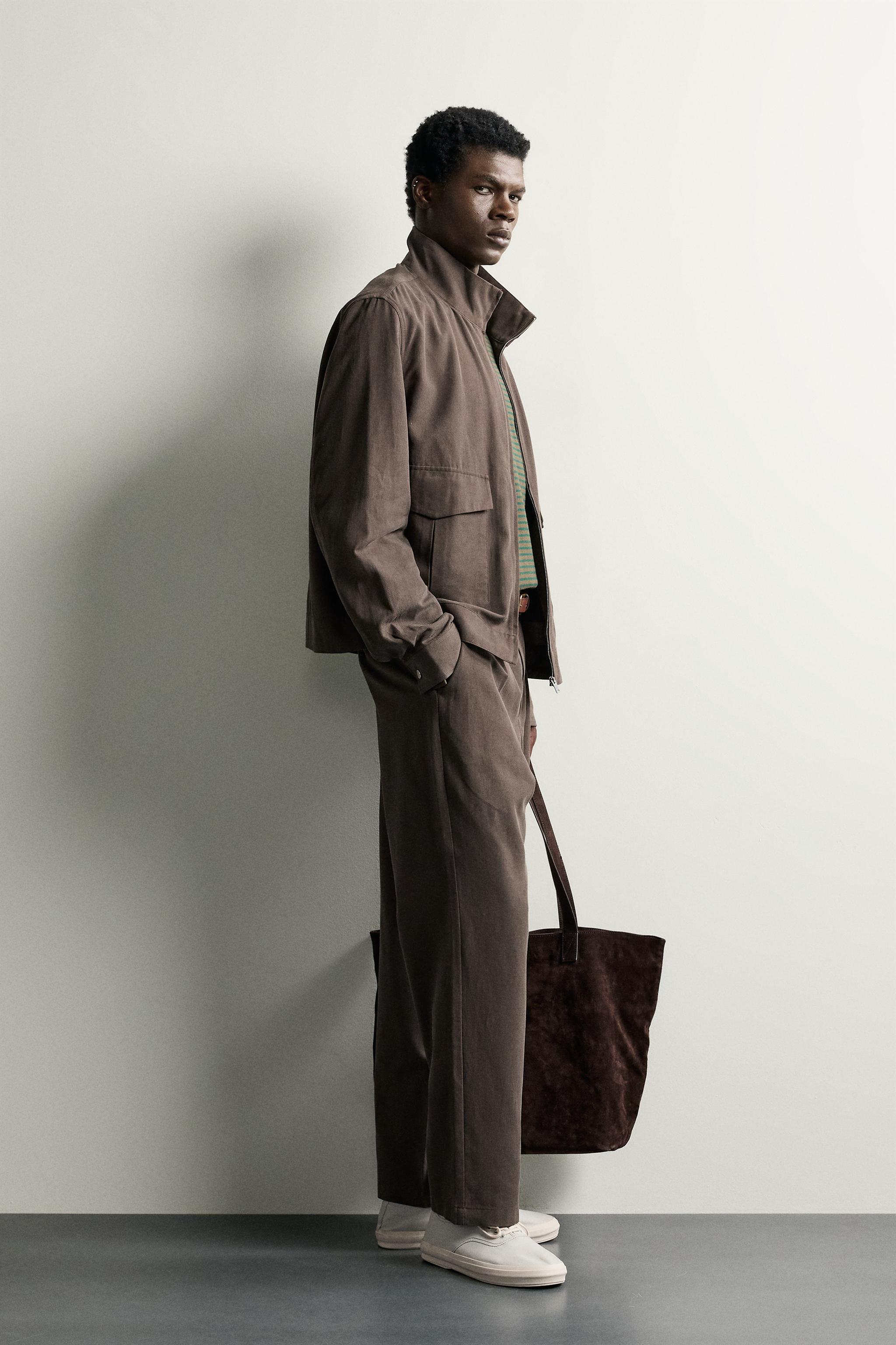 RELAXED FIT PLEATED PANTS
